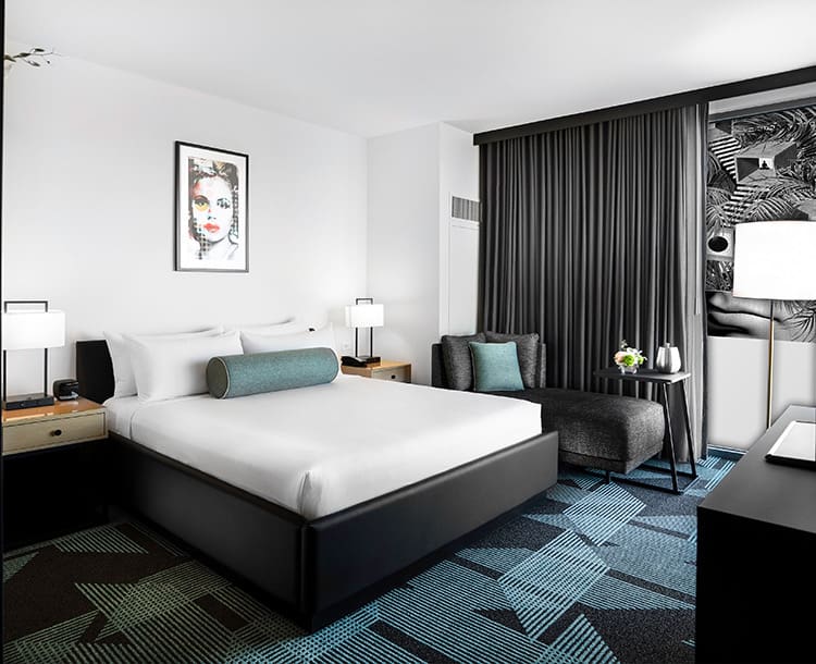 downtowngrandhotelandcasino-14-item302-roomsandsuites-virtualexperience-quadimage-6241d4354dd9b